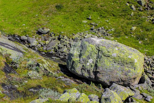 Huge boulders, big rocks by Storebottåne river Vavatn lake Norway.