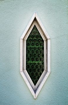 Wooden door and diamond shaped window