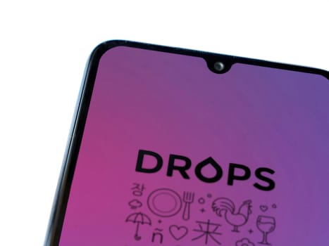 Drops - Language learning app launch screen with logo on the dis
