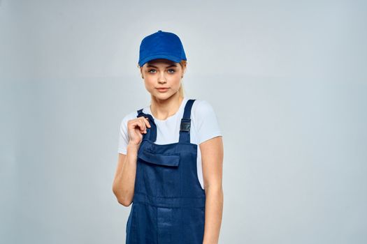 Woman in working uniform blue cap service lifestyle service