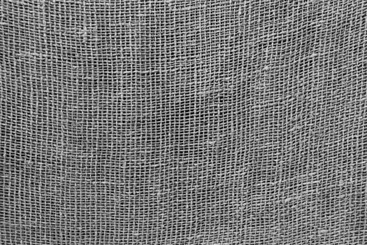Fine gray fabric or net. Background, texture.