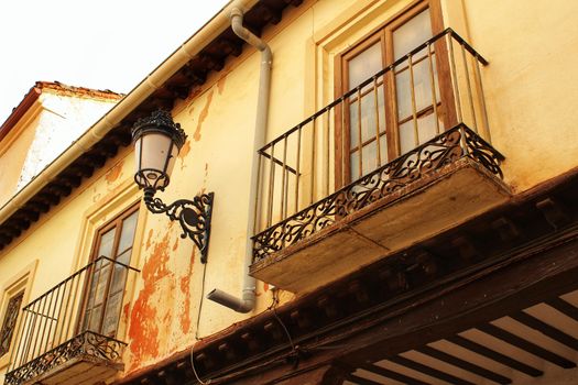 Old majestic facade and streetlight in Alcaraz village, Castile-la Mancha, Spain