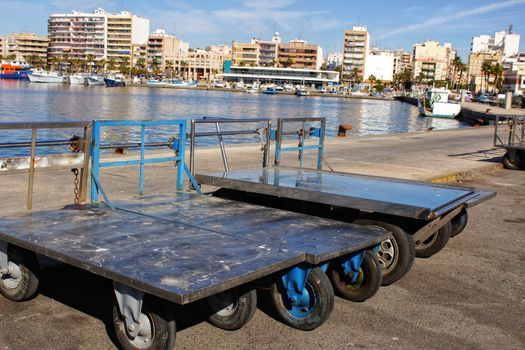 Metal trolleys to carry boxes of fish in the fishing port