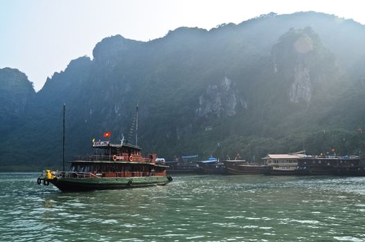 Original heritage fishing boat in the early morning at Halong Ba