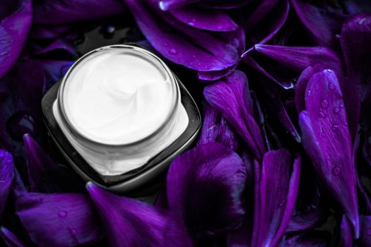 Luxury face cream moisturizer for facial skin on purple flower b
