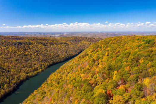 Narrow gorge of the Cheat River looking down towards the lake in West Virginia with fall colors