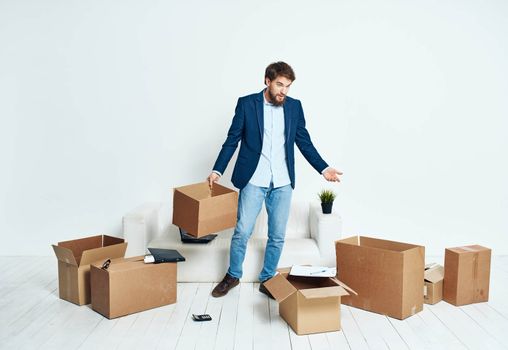 A man with a box in his hands dismissal packaging businessman Professional