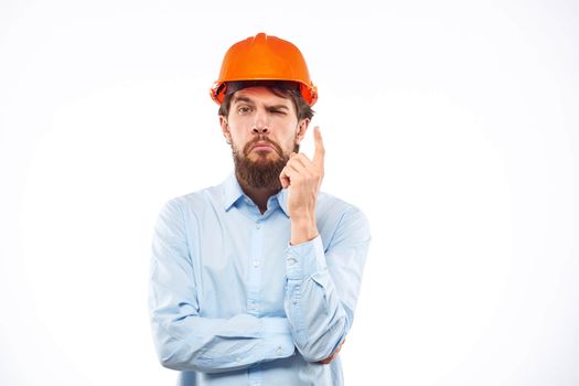 Man in working uniform orange hard hat lifestyle official
