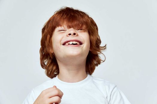 smile redhead boy head upward joy of childhood
