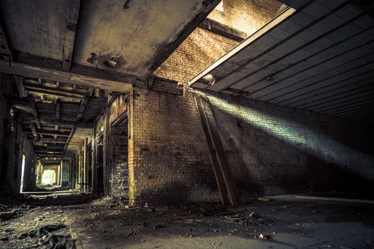 An old abandoned brick factory, a lost place with ancient history, vandalism and graffiti