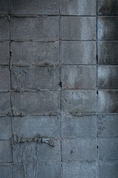 Dark scary dirty white grey brick wall