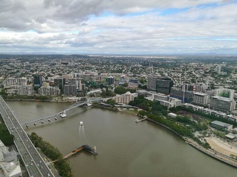 Wide bird eye view of Brisbane South bank scene in rainy afterno