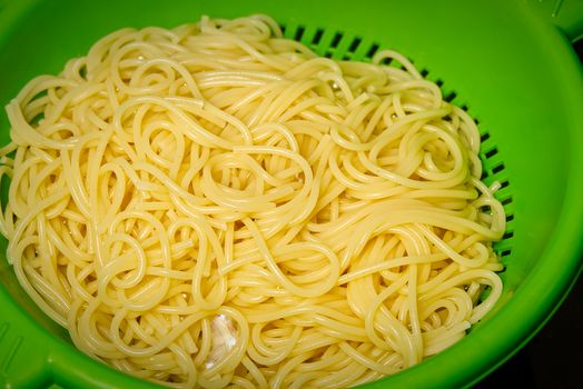 boiling pasta spaghetti in pot. penne rigate pasta- Cooking italian pasta