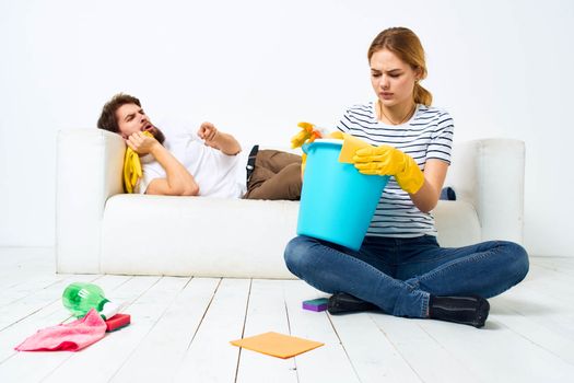 Married couple joint cleaning house cleaning supplies lifestyle