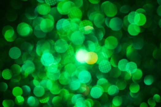 Green lights abstract bokeh backdrop. Chrismas lights bokeh.