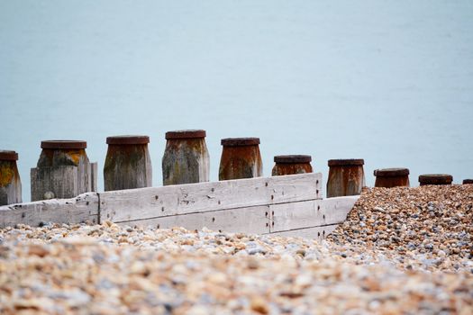 Wooden groynes to prevent coastal erosion in Eastbourne