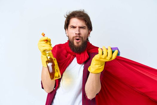 Man with cleaning supplies professional housework lifestyle