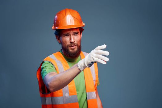 Bearded man Construction uniform hard work profession blue background