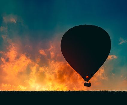 Silhouette of hot air baloon at sunset in Germany