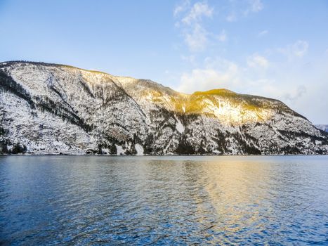 Winter landscape and morning time golden sunrise at Sognefjord Norway.
