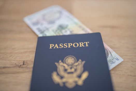 United States of America Passport with a Five Honduran Lempiras Bill Inside