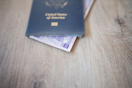 United States of America Passport with a Two Honduran Lempiras Bill Inside it
