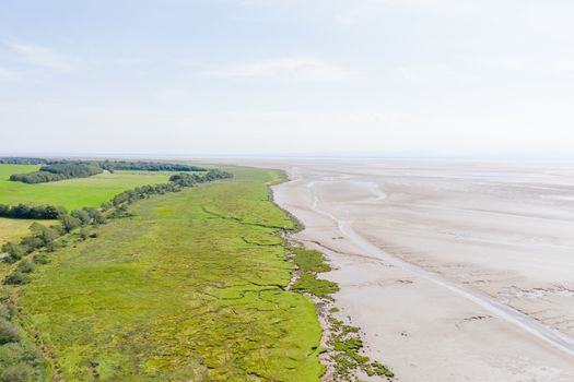 Aerial Landscape View of a Skyline over a Vast Sand and Grassland
