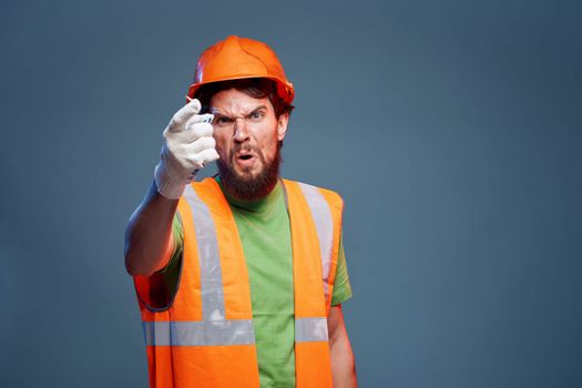Bearded man Construction uniform hard work profession blue background