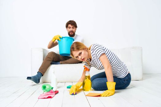 Man and woman washing supplies cleaning housework
