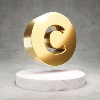 Copyright icon. Shiny golden Copyright symbol on white marble podium.