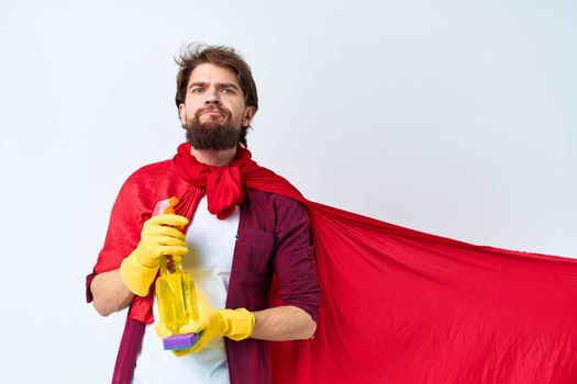 Cleaner in red cloak professional housework service