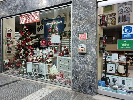 Thessaloniki, Greece Hellenic empty Christmas shop window showcase.