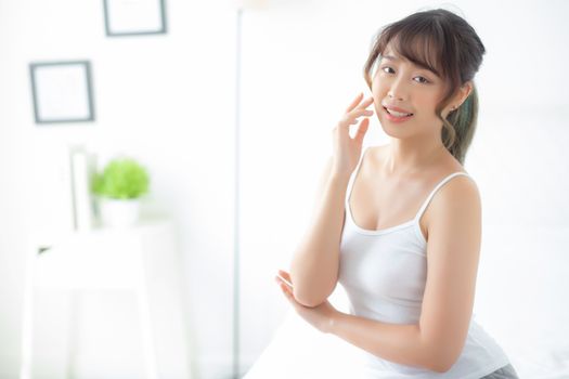 Portrait of beautiful young asian woman smile while wake up heal