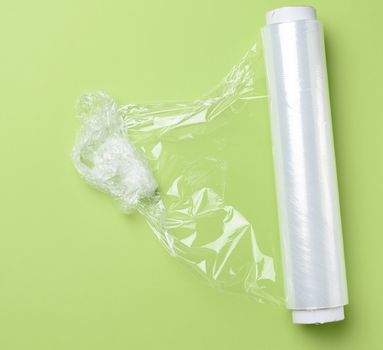  roll of transparent cling film for packaging products, green ba