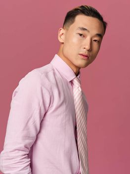 man asian appearance pink shirt tie self confidence isolated background