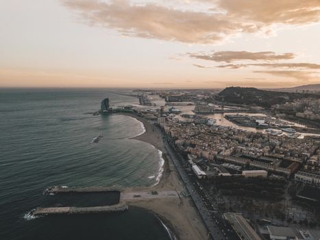 Aerial View of Barcelona, Spain with Harbor and Skyline at beautiful Sunset with Ocean View September 2019