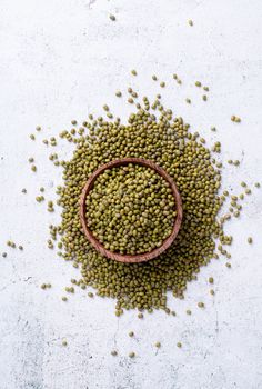 Mung beans top view on gray background