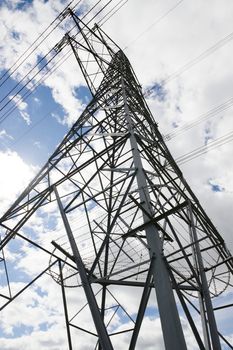 Vertical image of the converging lattice work of an electrical pylon
