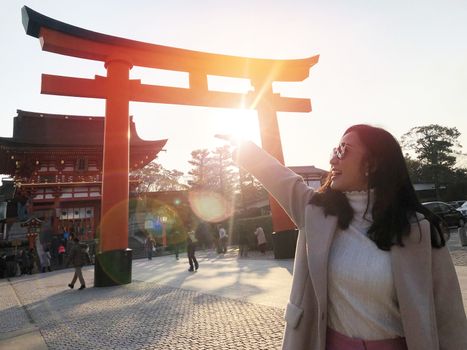  Young woman tourist travel Kyoto, Japan at Fushimi Inari Shrine