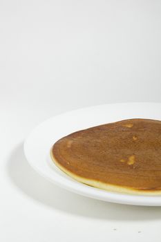 Freshly baked pancake on a plate