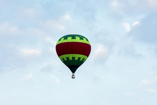 Balloon against the blue sky in flight