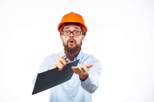 Cheerful man in orange hard hat construction documents service professionals