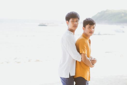 Homosexual portrait young asian couple standing hug together on 