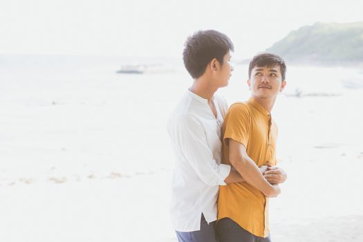 Homosexual portrait young asian couple standing hug together on 