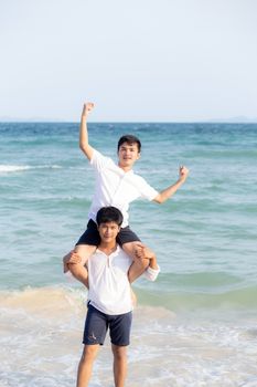 Homosexual portrait young asian couple riding the neck together 