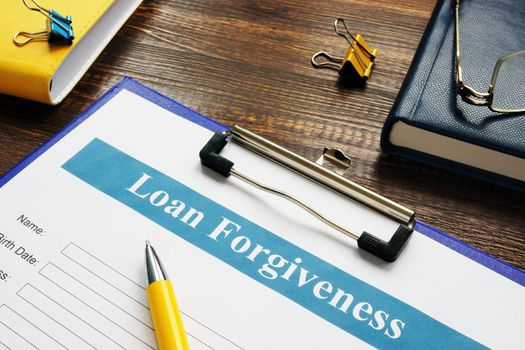 Form of Loan Forgiveness Agreement and yellow pen.