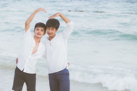 Homosexual portrait young asian couple stand gesture heart shape