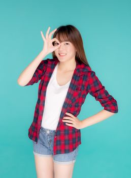 Beautiful happy young asian woman wear travel summer gesture ok 