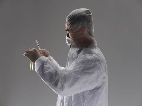 Male laboratory assistant protective clothing research science development