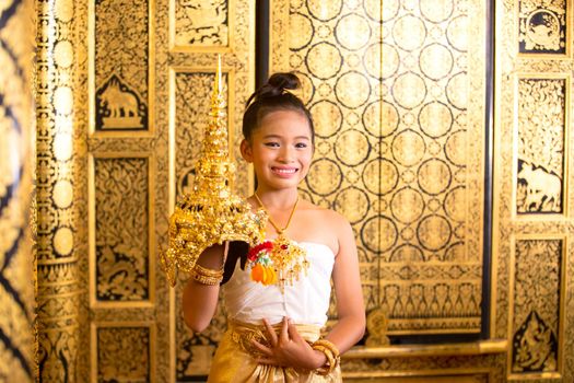 Thai traditional dress. Young kid Actors performs Thai ancient dancing Art of Thai classical dance in Thailand